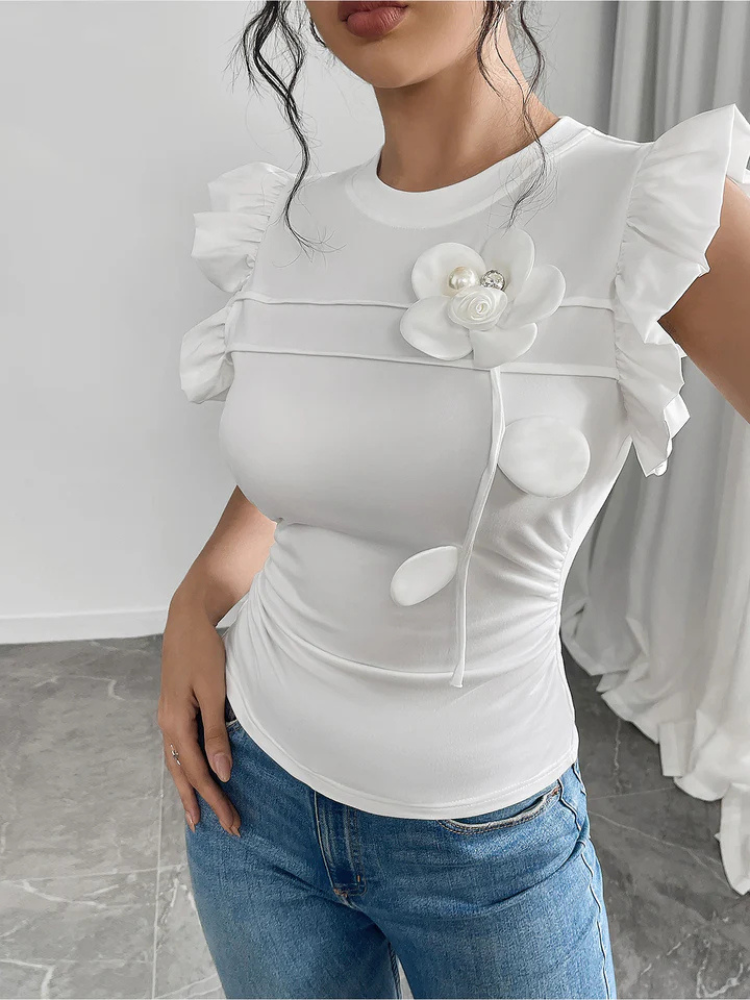 Eliselle | Women’s Blouse | Ruffled Cap Sleeve Floral Accent
