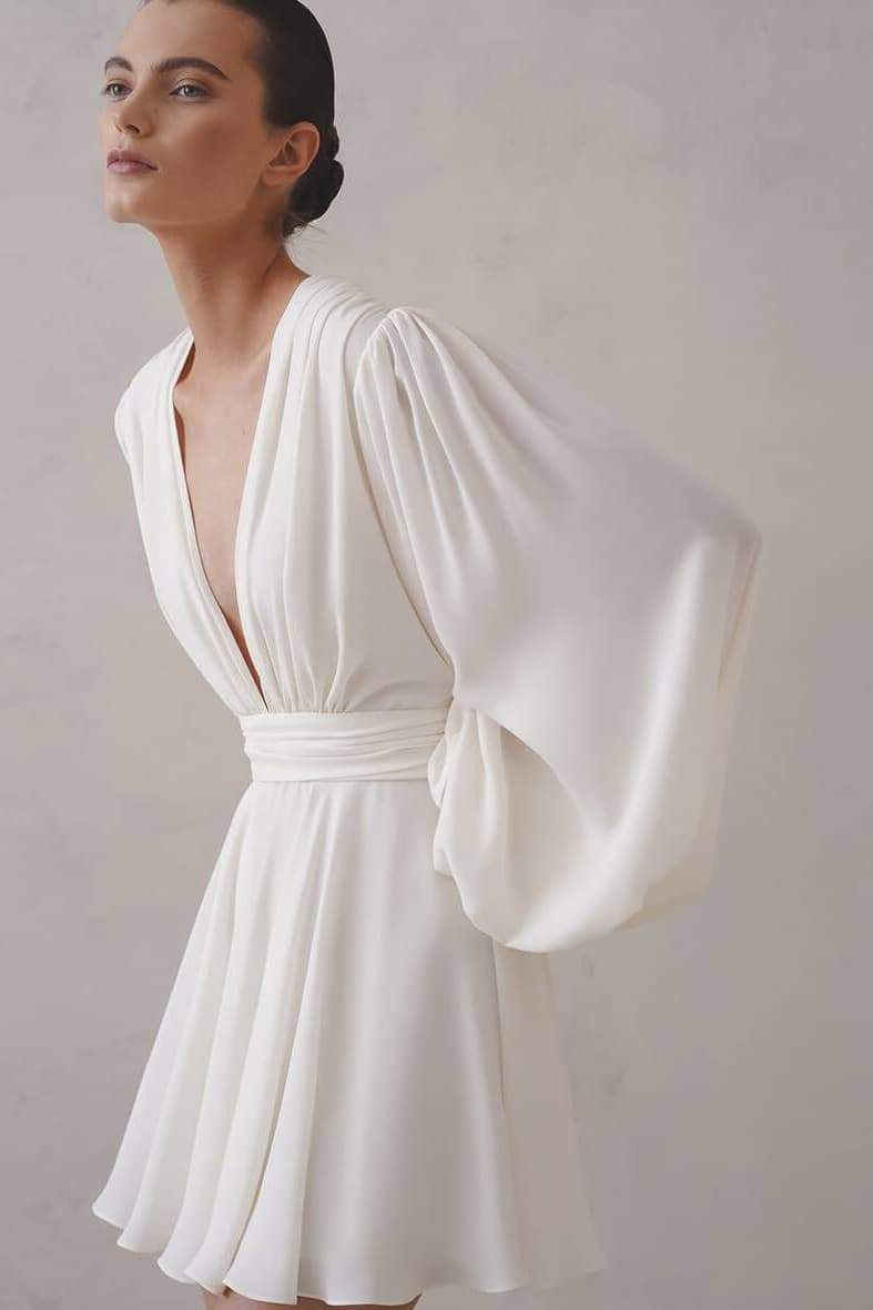 Elegant Flowy Mini Dress | Black & White | Deep V-Neck & Statement Sleeves