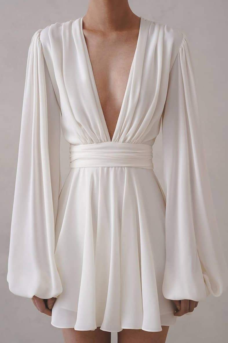 Elegant Flowy Mini Dress | Black & White | Deep V-Neck & Statement Sleeves